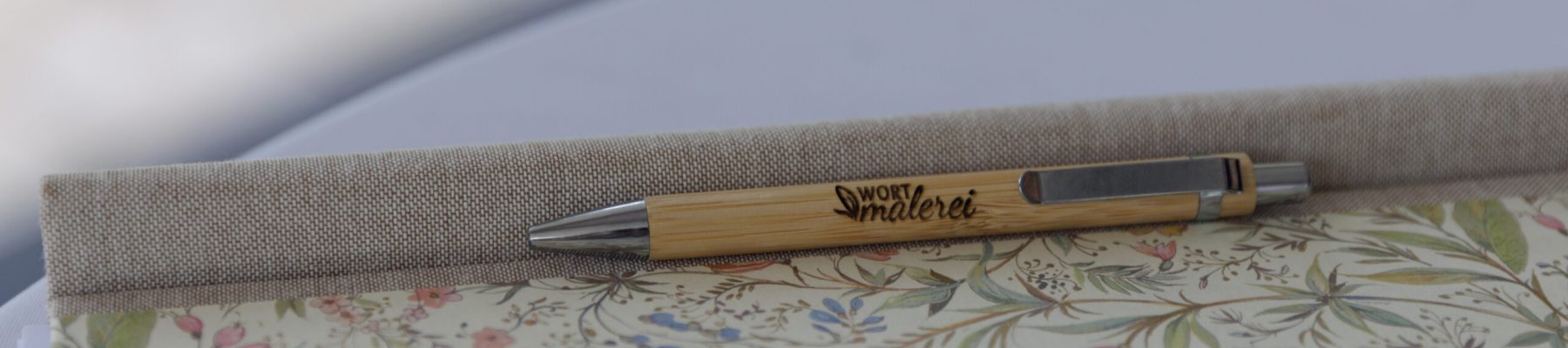 Wortmalerei-9 Rednermappe mit graviertem Stift